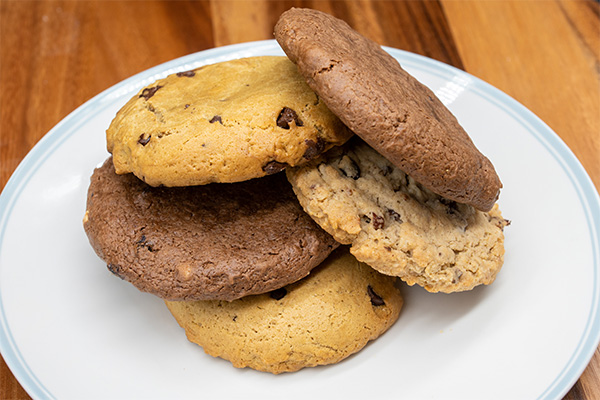 Warm cookies on a plate, a dessert enjoyed after our Golden Triangle, Cherry Hill Margarita Pizza.