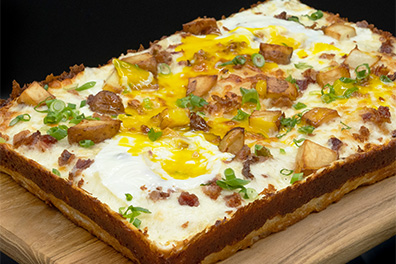 Detroit Style Pizza prepared for Gibbsboro pizza restaurant delivery.